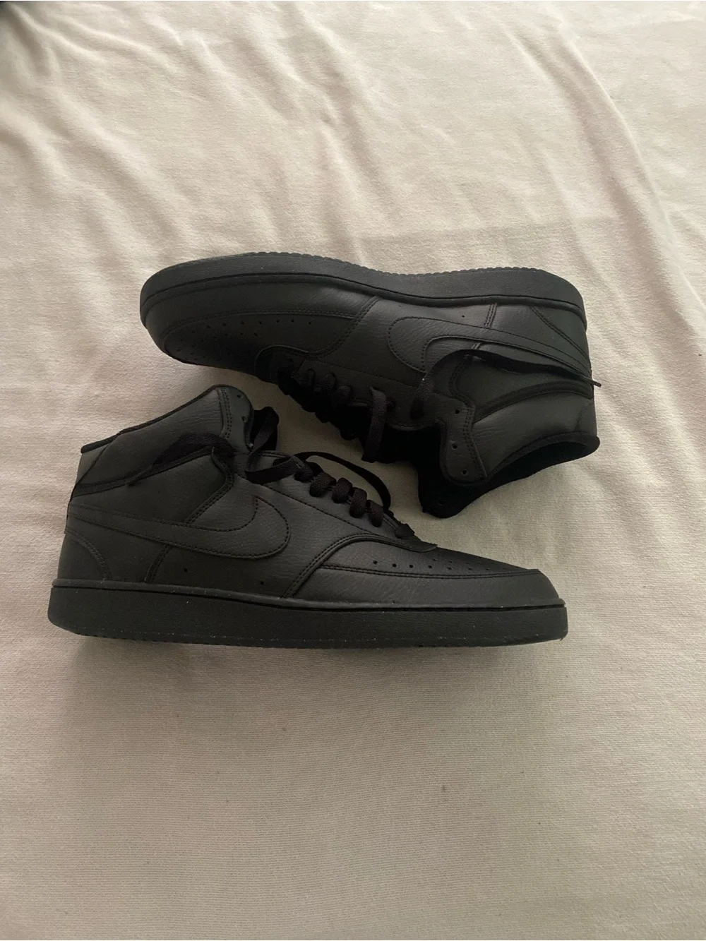 Nike Men’s Black Low-Top Leather Sneakers